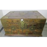 A vintage hardwood Zanzibar chest of small proportions, with hand hammered pierced brass