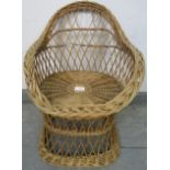 A vintage wicker child’s tub chair Condition report: Some wear consistent with age. H53cm W40cm