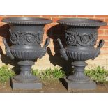 A pair of large 19th century cast iron handled urns of campara form, made by the Andrew