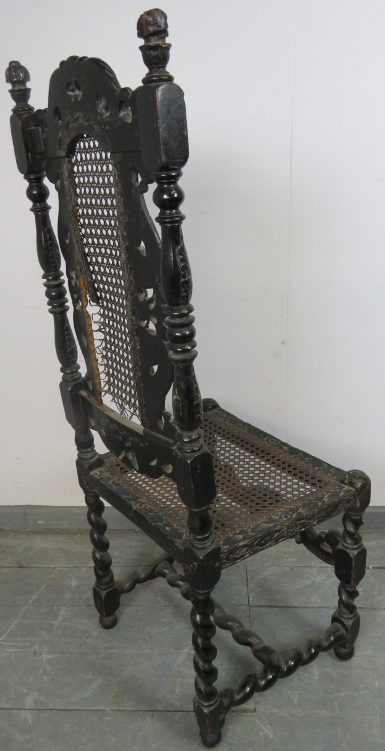 A 19th century Carolean style oak hall chair, ornately carved with acanthus leaves and roundels, - Image 4 of 5