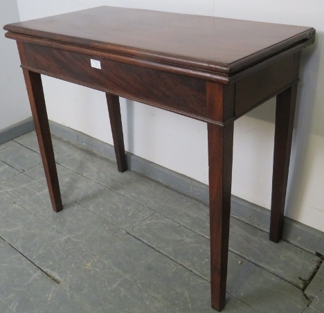 A turn of the century mahogany turnover tea table with single blind drawer, on square supports. - Image 2 of 5