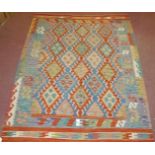 Anatolian Kilim rug, good strong vibrant colours, repeat diamond pattern and in good condition,