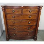 A large 19th century mahogany bow-front chest of two short over four long graduated cock-beaded