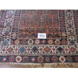 An early 20th century Persian rug of unusual size. Colour good, no signs of repair. 346cm x 102 -