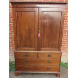 A George III mahogany linen press by Gillows of Lancaster, the twin doors strung with satinwood