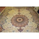 An excellent Persian Meshed carpet, large central motif, set on cream ground 393cm x 272cm. Very