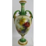 A late 19th century Hadley's Worcester fine porcelain vase, hand painted with wild flowers between