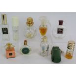 A collection of vintage perfume bottles including a Lalique Worth bottle, Nina Ricci, Carven, 47111,