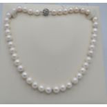 An exceptionally rare strand of soft white Australian Southsea pearls with rose undertones and 8