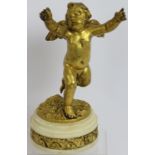 A fine quality 19th century Ormulu bronze figure of a putti cherub mounted on an Ormulu banded white