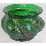 An early 20th century iridescent green glass bowl of squat form in the style of Pallme-Konig. Height