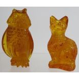 A carved Baltic Amber figure of a cat and a similar figure of an owl. Tallest 7cm. (2). Condition