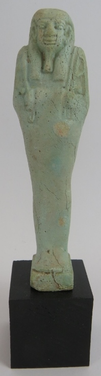 An ancient Egyptian faience ushabti decorated in light blue glaze, believed to be c1070-945 BC.