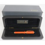 A 1980s Parker Duo Fold International fountain pen, brand new old stock. Orange body, 18ct gold nib,
