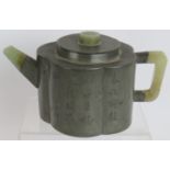 A 19th century pewter encased Chinese Yixing teapot with pale Celadon jade handle finial and