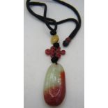 A rare Chinese blood jade pendant with inscription & bone disc with engraved Buddha, inscription an