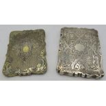 A Victorian silver gilt card case with flower & scroll decoration, Birmingham 1845 and another