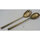 A pair of silver salad servers, Birmingham 1922. Approx weight 3 troy oz/100 grams. Condition