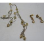 A delicate gold vermeil on silver necklace and a pair of drop earrings set with quartz, boxed.