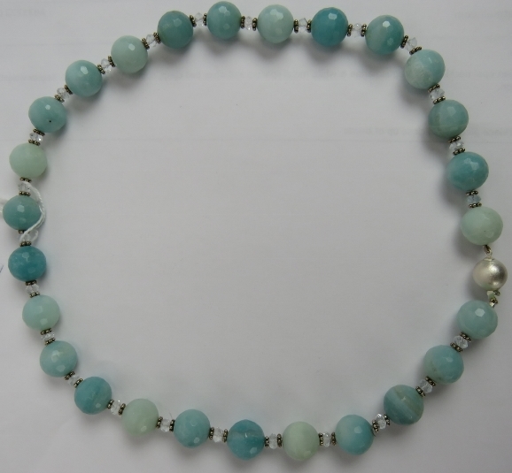 A blue Peruvian opal necklace with aquamarine & white metal spacers and silver ball clasp, approx