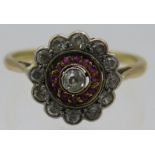 A diamond & amethyst antique cluster ring set with diamonds & amethyst, size O. Centre diamond