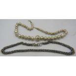American Indian white metal necklace with graduated hollow beads, approx weight 49 grams and a heavy