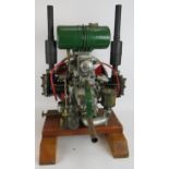 A vintage Norman type T300 stationery engine on wood block mount. Height 68cm. Condition report: