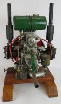 A vintage Norman type T300 stationery engine on wood block mount. Height 68cm. Condition report: