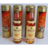 Four bottles of Bells 8 year old Scotch Whisky in presentation tins. 70cl 40% vol. (4). Condition