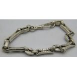 An unusual silver engraved link bracelet/albertina with lobster clasp, marked 925 sterling, approx