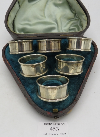 A set of six plain silver napkin rings, Birmingham 1951 and 1952, original box. Approx weight 2.4