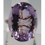 Pink amethyst cocktail ring. Large high set 20mmx 15mm oval faceted solitaire of good cut colour and