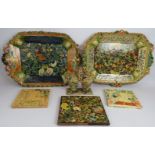 Two highly decorative continental Majolica platters, a two jar serving cruet and three hand