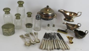 A quantity of mainly silver plated wares including sauce boats, teaspoons, fruit knives, butter