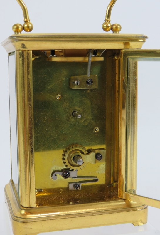 A 19th century gilt brass cased carriage clock with engraved gilt mask and enamelled dial ting. - Image 4 of 8
