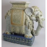 A large Chinese pottery elephant plant stand with glazed decoration. Seal mark to corner. Height