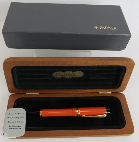 A 1980s Parker Duo Fold Centennial fountain pen, brand new old stock, orange body, 18ct gold nib,