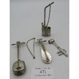 A collection of 3 white metal miniature Chinese musical instruments and an opium pipe, all signed.