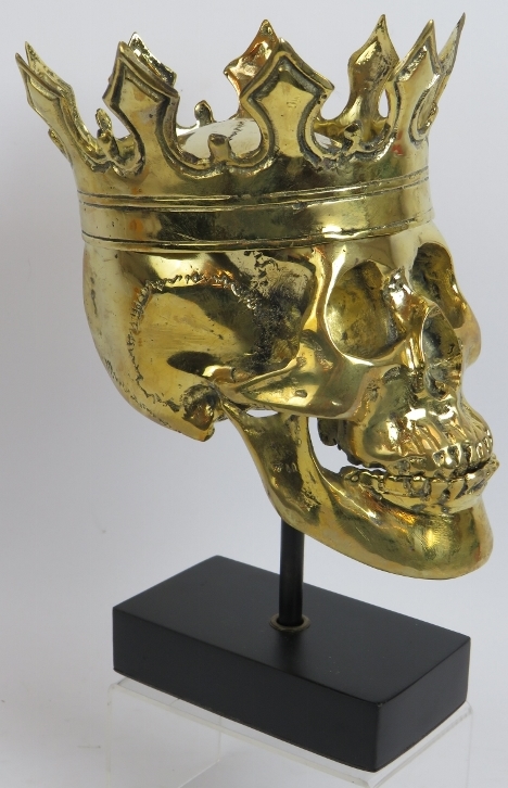 A contemporary polished bronze model of a human skull wearing a crown mounted on a bespoke plinth. - Image 3 of 4