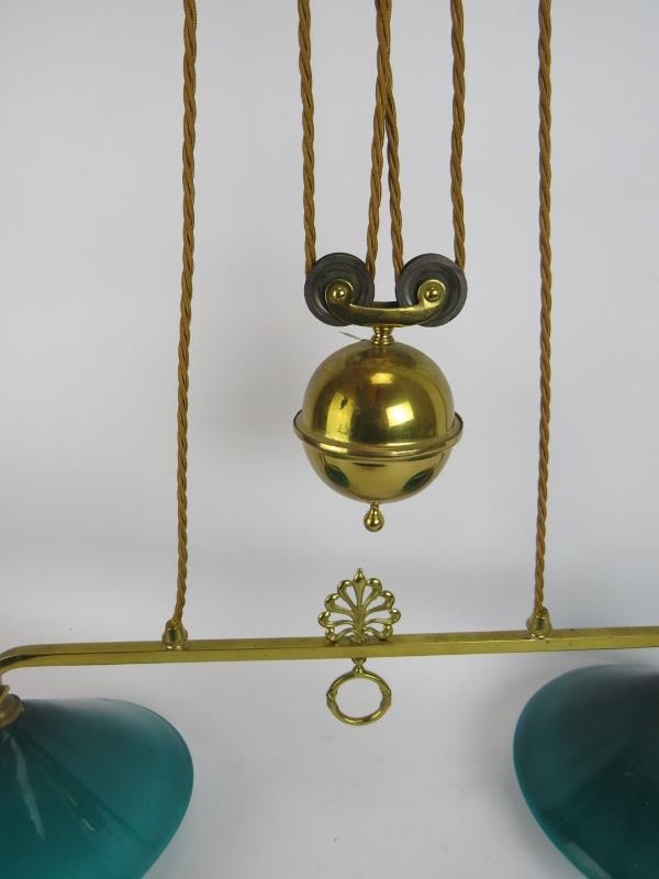 A period brass two lamp rise and fall ceiling light with Emeralite green glass shades. Width 78cm. - Image 3 of 3