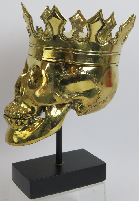 A contemporary polished bronze model of a human skull wearing a crown mounted on a bespoke plinth. - Image 2 of 4