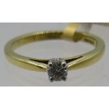 An 18ct gold single stone diamond set ring, diamond approx 0.14cts, approx weight 2.8 grams, size L.