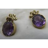 A pair of collet set amethyst earrings, matching previous lot. Amethyst approx 12mm x 10mm, approx