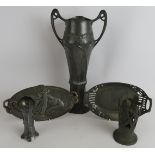 Two Art nouveau WMF pewter dishes, one depicting a child and snail, a WMF two handled vase (no