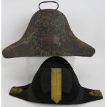 A 19th century British naval officer's bicorn hat with toleware tin. Gold braided and with