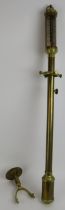 A brass ships barometer with gimball wall mount, signed Rosetti London 1892. Length 92cm.