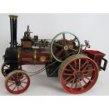 A live steam 1 1/2" scale model of a ALLCHIN steam tractor "Royal Chester" traction engine. Length