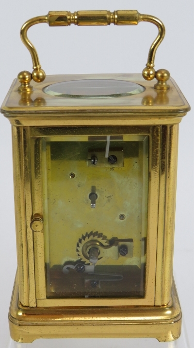 A 19th century gilt brass cased carriage clock with engraved gilt mask and enamelled dial ting. - Image 3 of 8