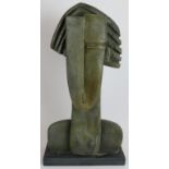 A large stoneware sculpture "Lockdown Head" by Peter Hayes (B.1946) mounted on a polished slate