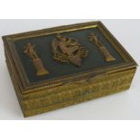 A small French Empire Revival gilt brass trinket box with green velvet lining. 8cm x 6cm x 2.5cm.
